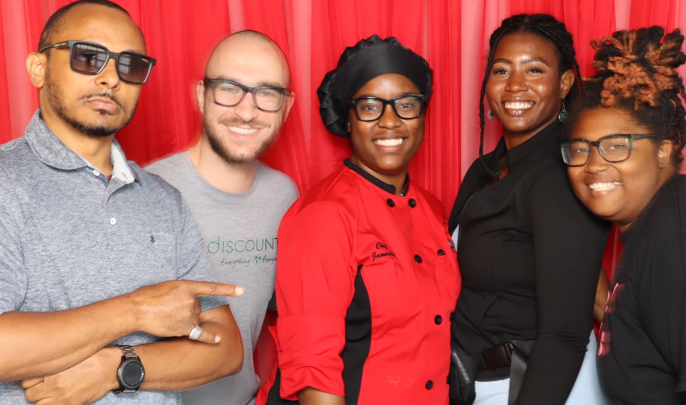 Merchants on the platform together at a local market event.